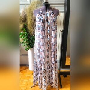 Elegant sheer, modern print maxi dress